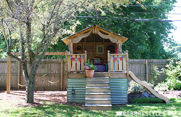 Backyard Playhouse Makeover - We painted the hideaway!